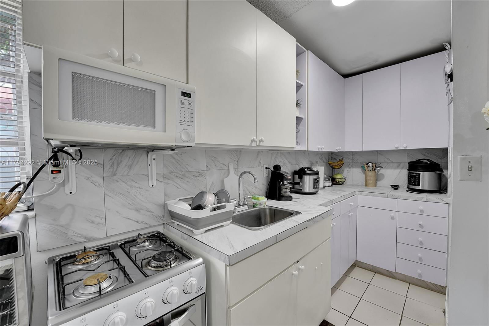 Real estate property located at 220 61st St, Miami-dade, 4th Avenue Extension To H, Hialeah, FL