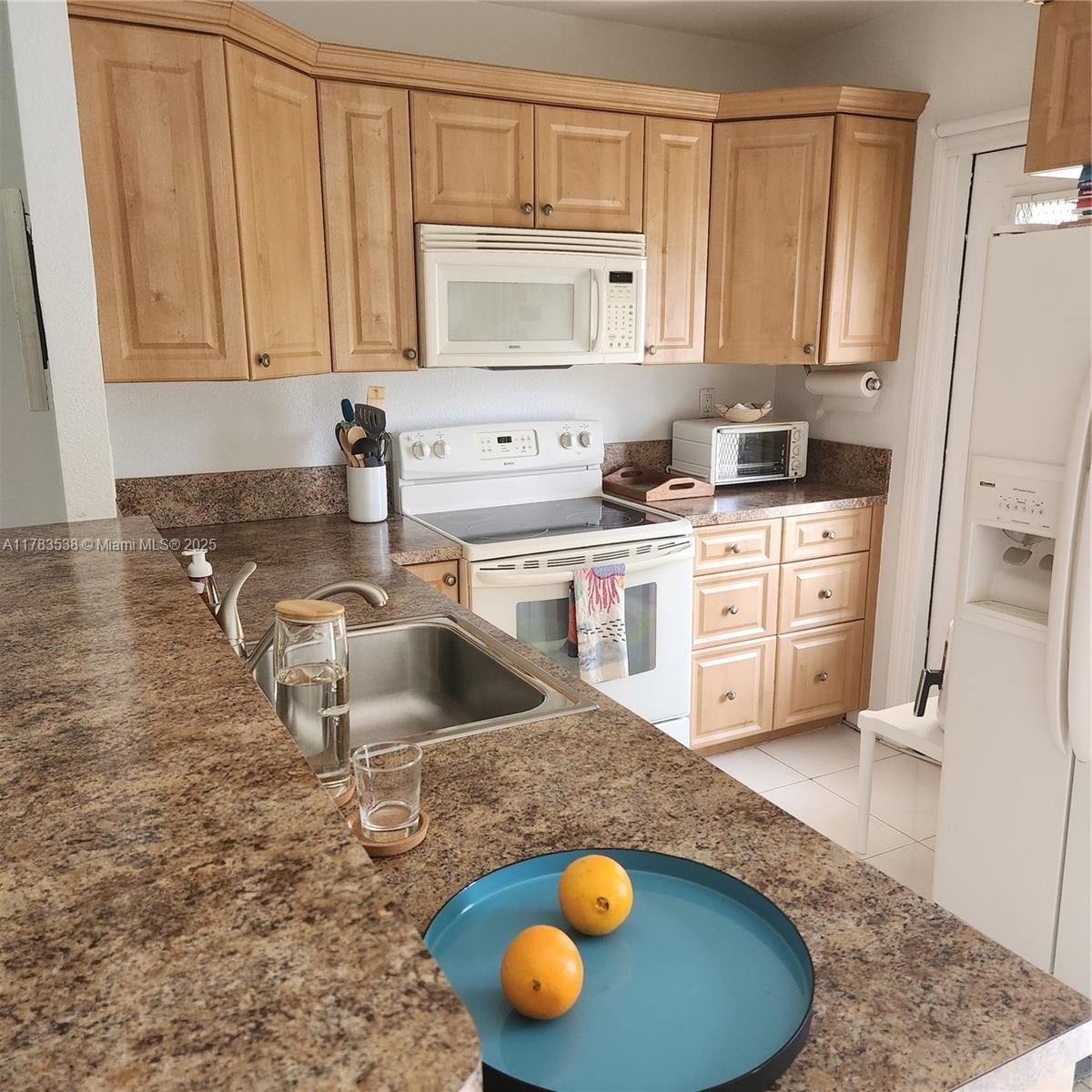 Real estate property located at 5141 Oakland Park Blvd #311, Broward, Melaleuca Gardens Condo, Lauderdale Lakes, FL