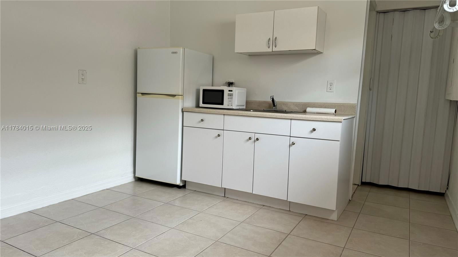 Real estate property located at 7733 200th St, Miami-dade, North Palm Estates Homes, Hialeah, FL