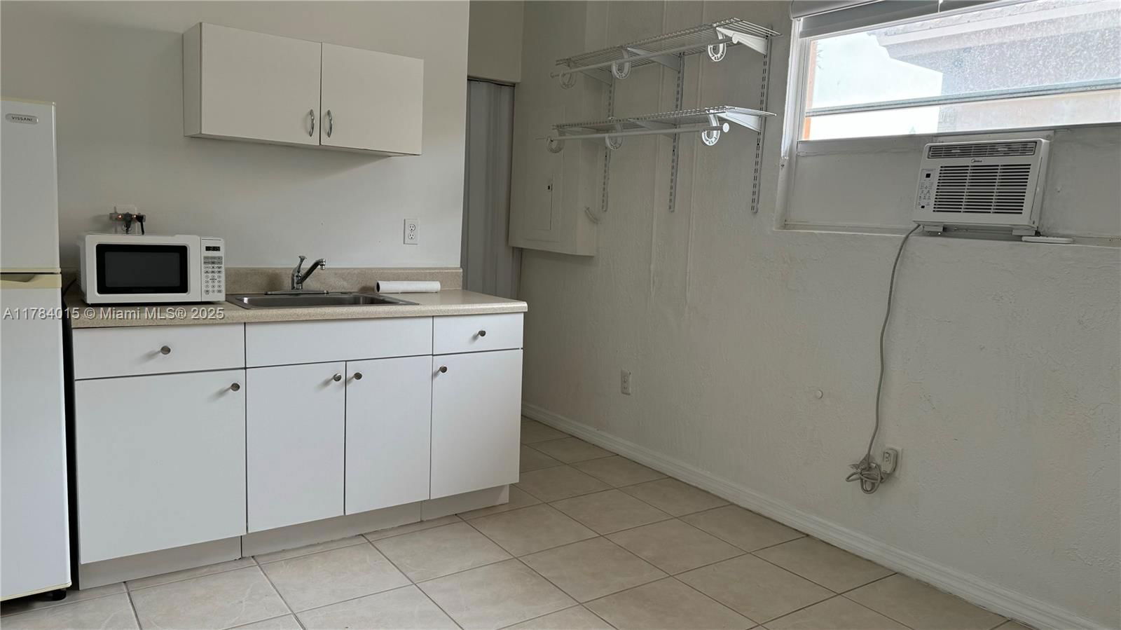 Real estate property located at 7733 200th St, Miami-dade, North Palm Estates Homes, Hialeah, FL