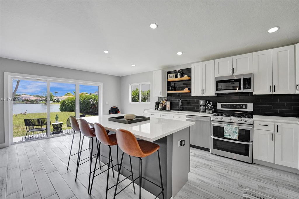 Real estate property located at 13460 6th Dr, Broward, Sawgrass Plantation, Plantation, FL
