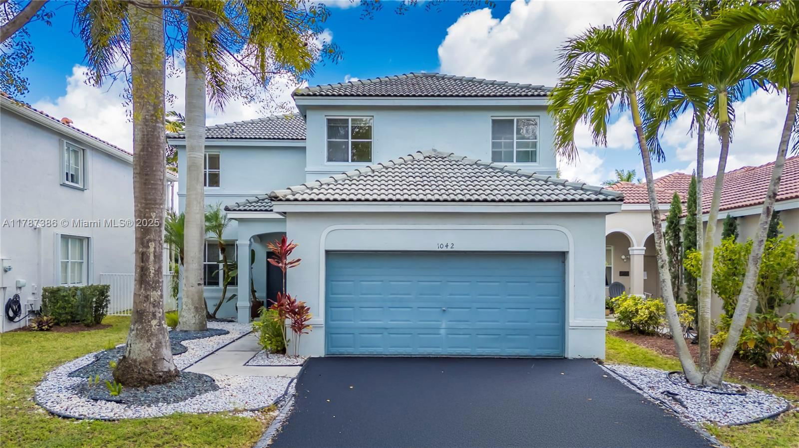 Real estate property located at 1042 Bluewood Ter, Broward, Sector 2-parcels 11 27 28, Weston, FL