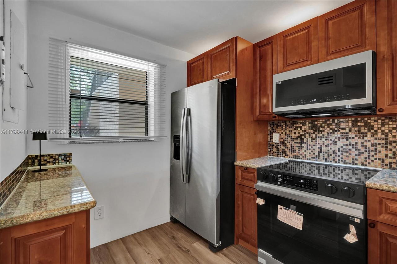 Real estate property located at 15705 Waterside Cir #104, Broward, Waterside Village Three C, Sunrise, FL