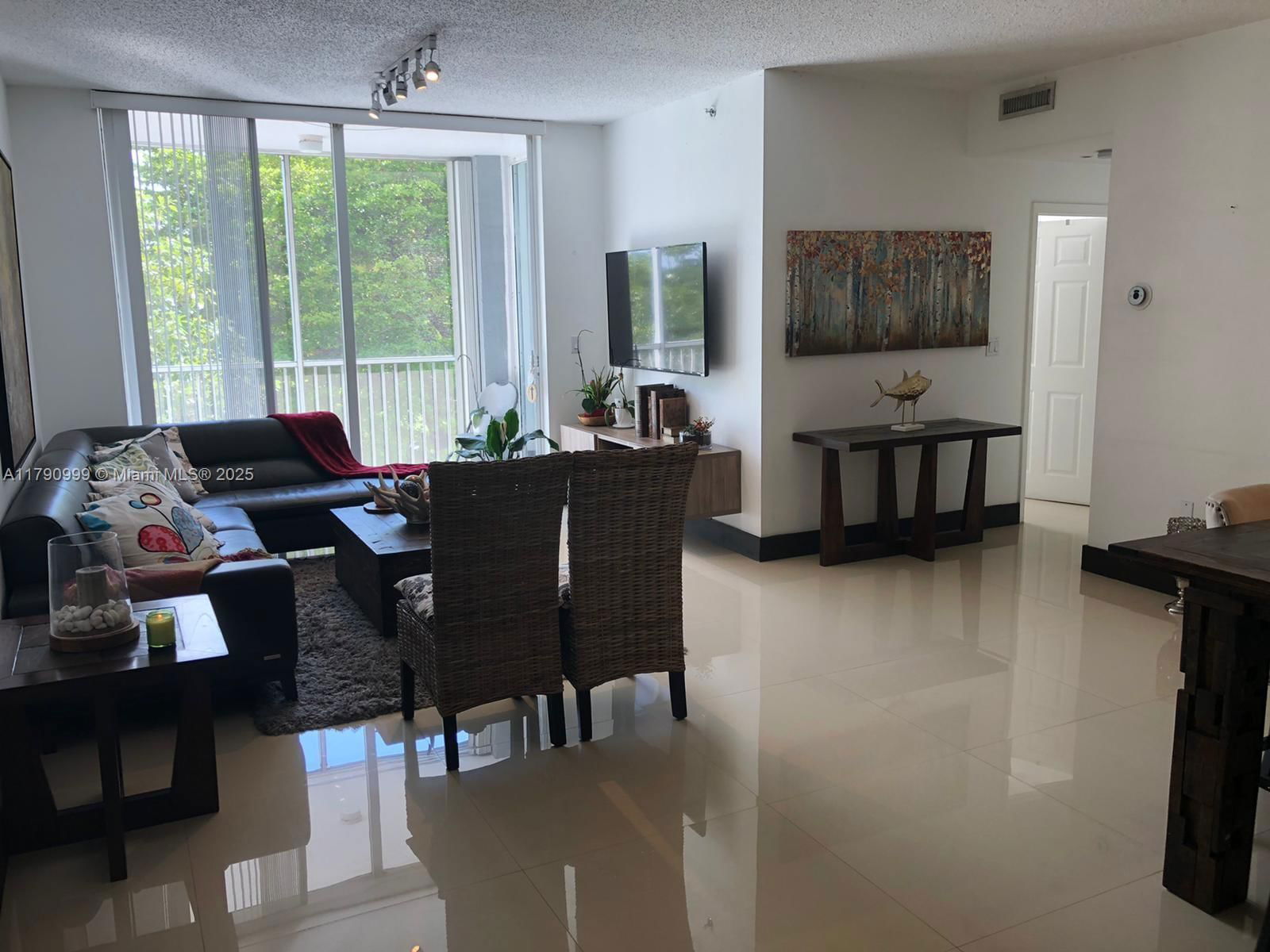 Real estate property located at 9725 52nd St #407, Miami-dade, Doral House Condo No 3, Doral, FL