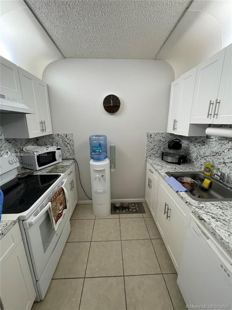 Real estate property located at 8240 210th St #214, Miami-dade, Saga Bay Gardens Condo, Cutler Bay, FL
