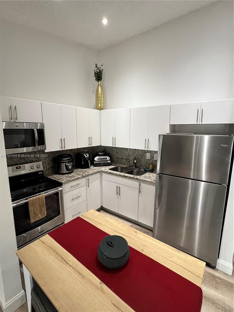 Real estate property located at 19055 62nd Ave #212, Miami-dade, Countryside Village Condo, Hialeah, FL