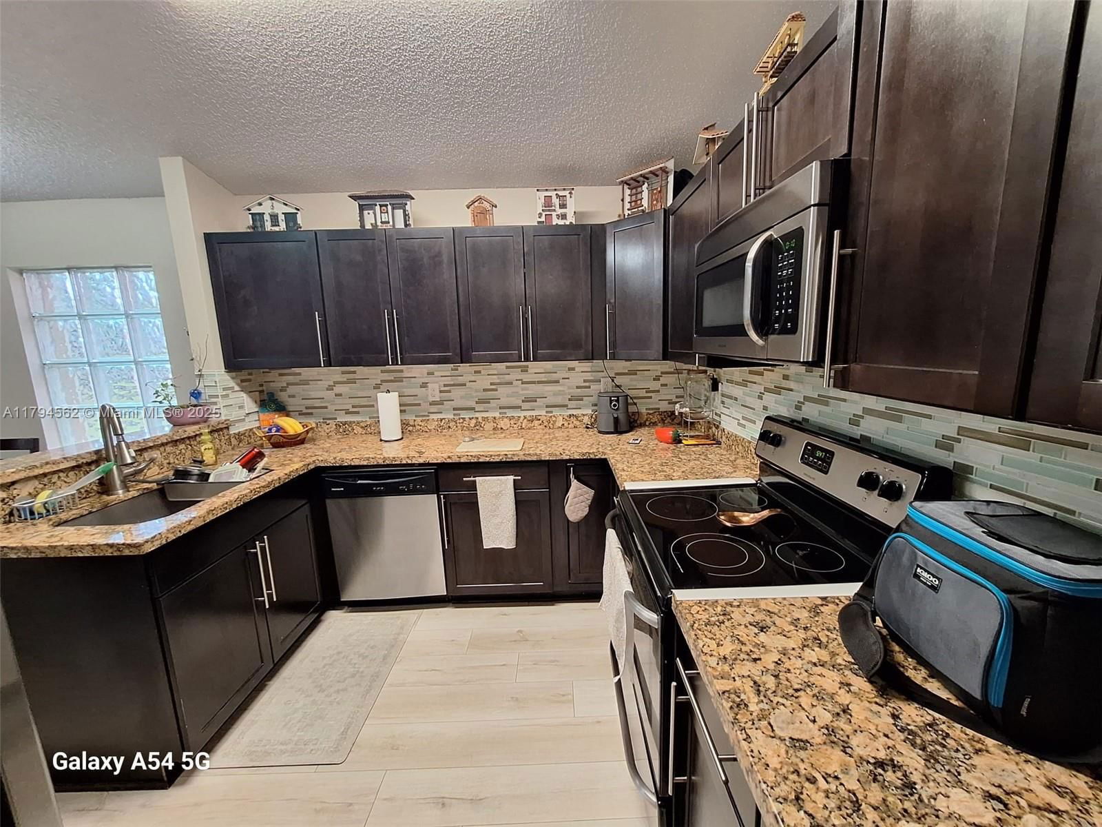 Real estate property located at 20401 1st St, Broward, Crystal Pointe, Pembroke Pines, FL
