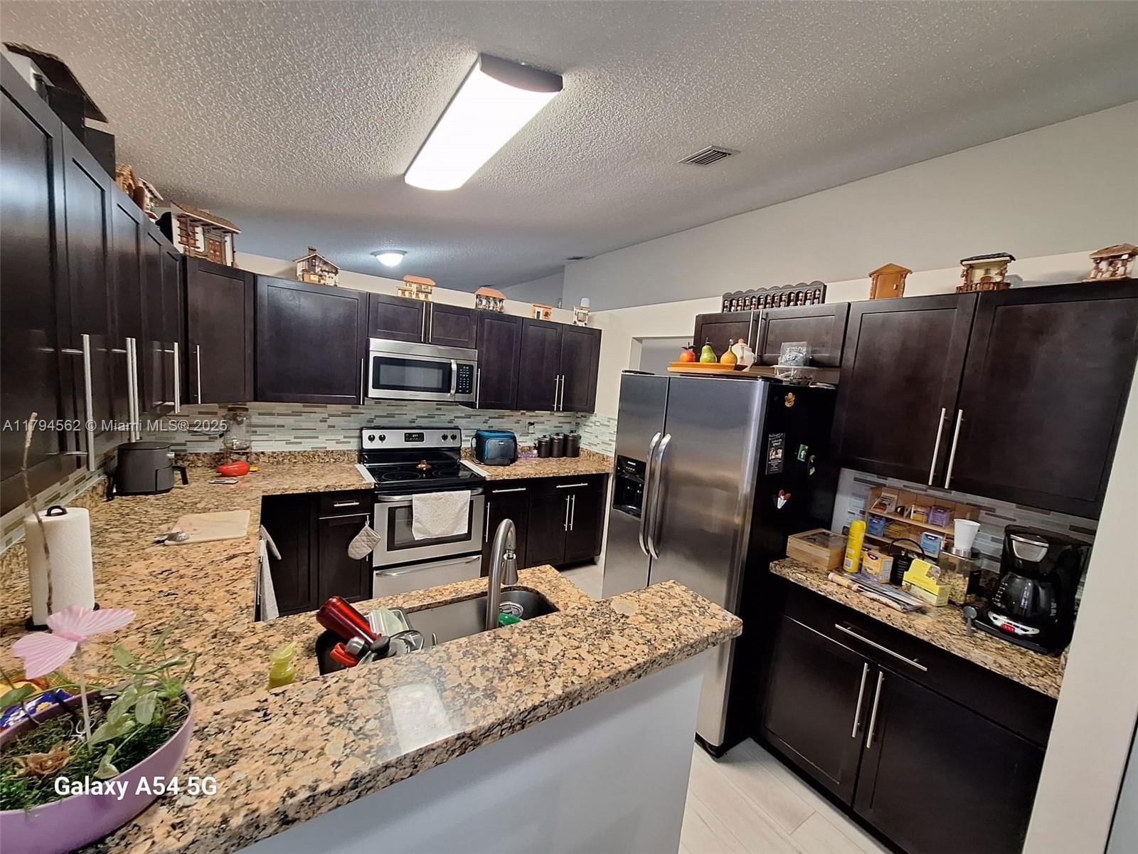 Real estate property located at 20401 1st St, Broward, Crystal Pointe, Pembroke Pines, FL