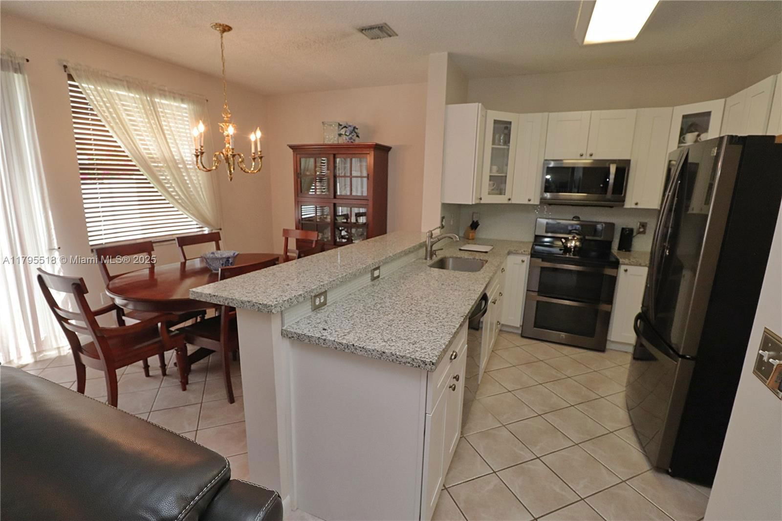 Real estate property located at 1427 154th Ln, Broward, Towngate Park Crossing, Pembroke Pines, FL