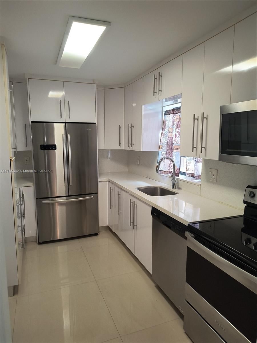 Real estate property located at 20841 San Simeon Way #104, Miami-dade, Fairview Of Calf Cl Condo, Miami, FL