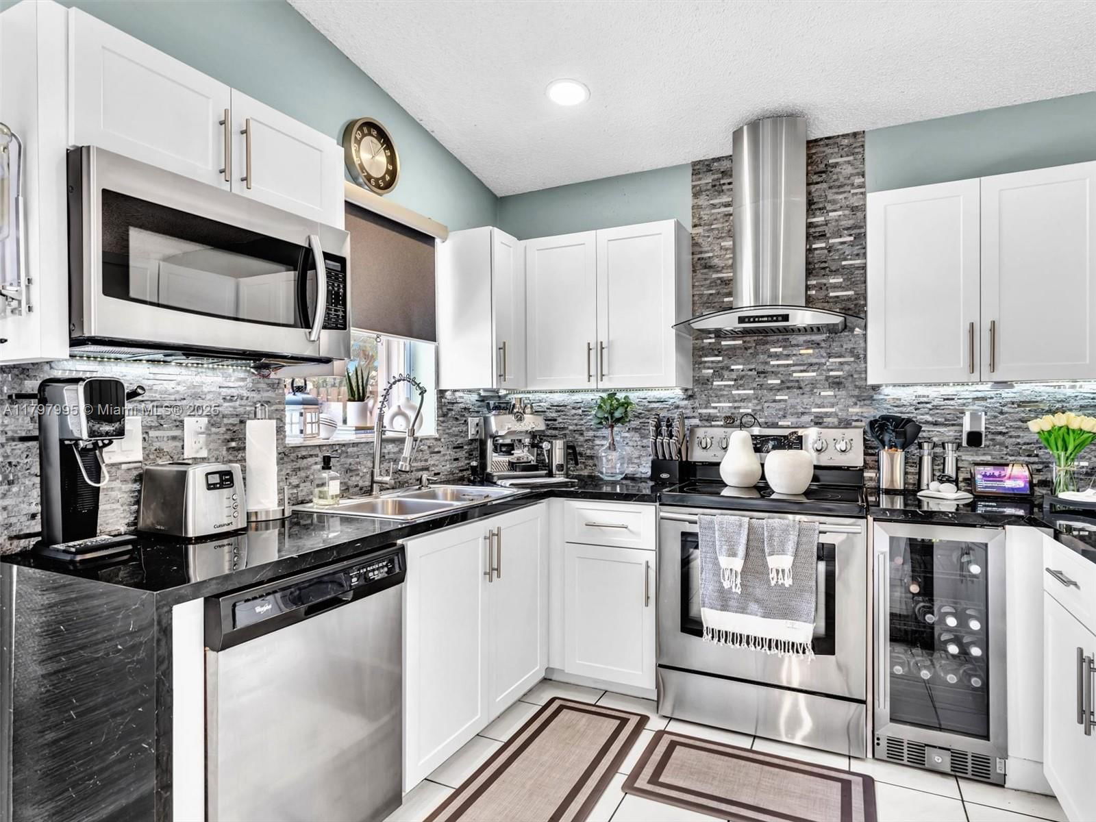 Real estate property located at 5206 99th Ave, Broward, Parkwood Homes Three, Sunrise, FL