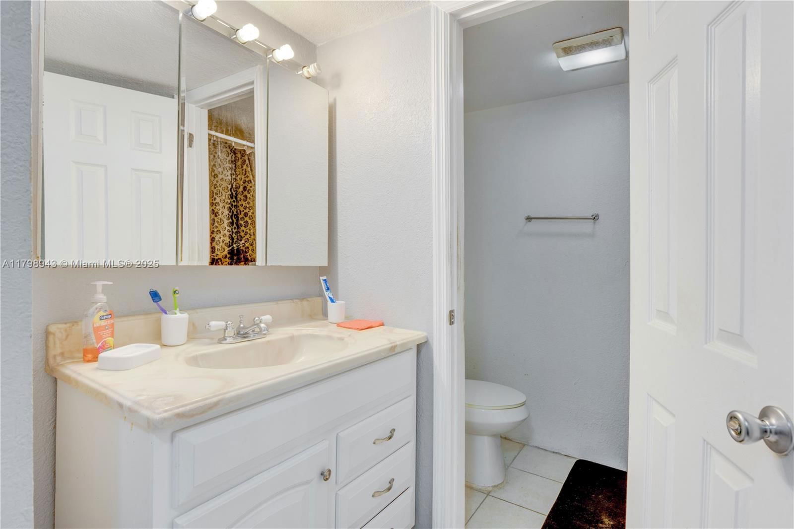 Real estate property located at 4848 24th Ct #215, Broward, Town Square Condo, Lauderdale Lakes, FL