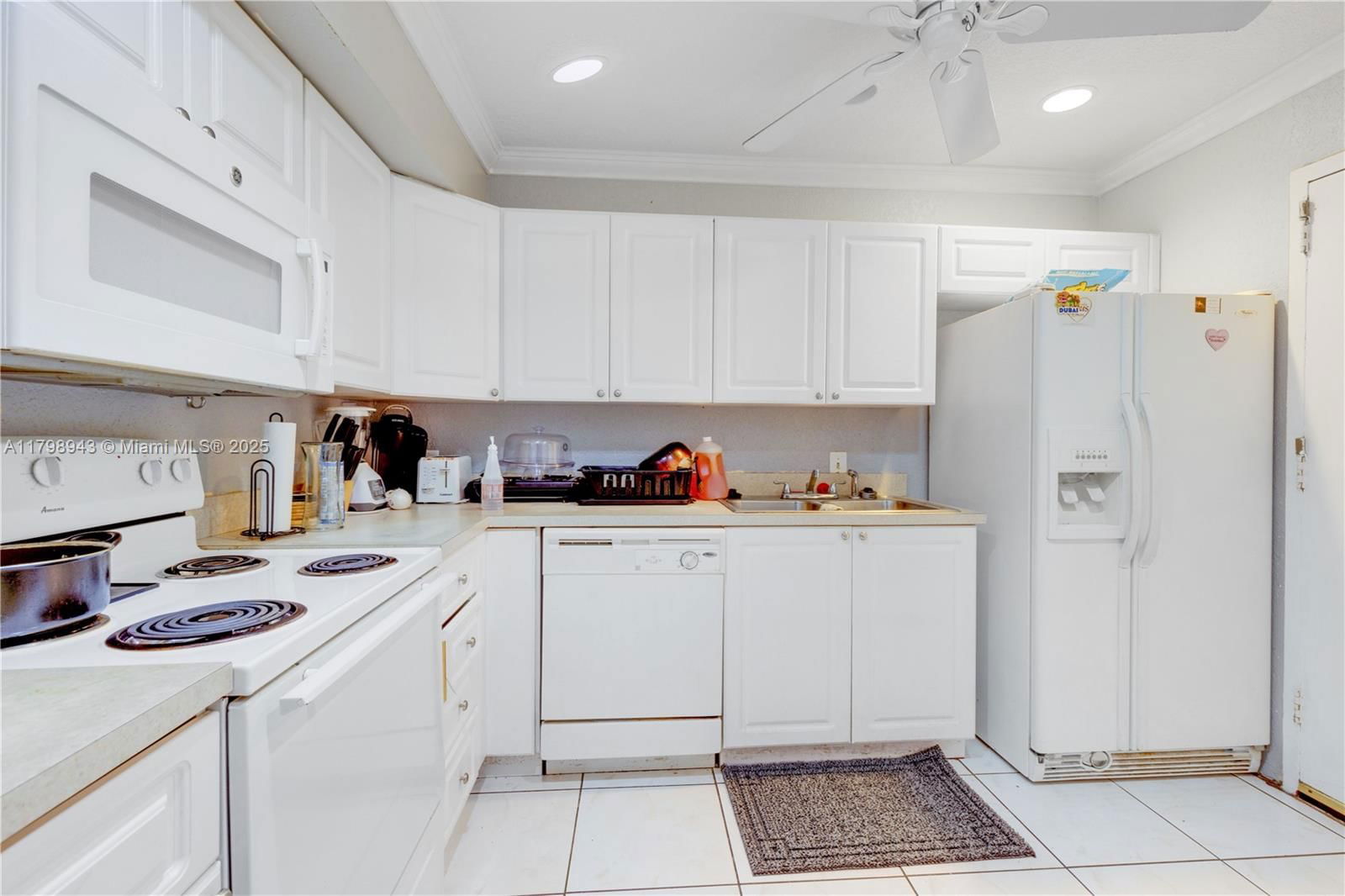 Real estate property located at 4848 24th Ct #215, Broward, Town Square Condo, Lauderdale Lakes, FL