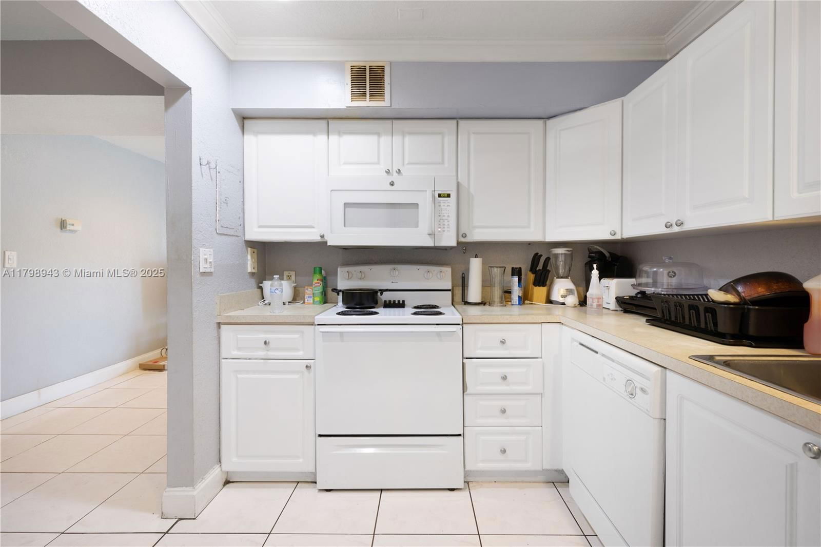 Real estate property located at 4848 24th Ct #215, Broward, Town Square Condo, Lauderdale Lakes, FL