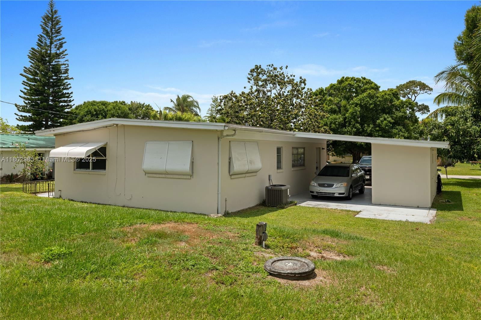 Real estate property located at 409 Poplar Ave, St Lucie, River Park Unit 2, Port St. Lucie, FL