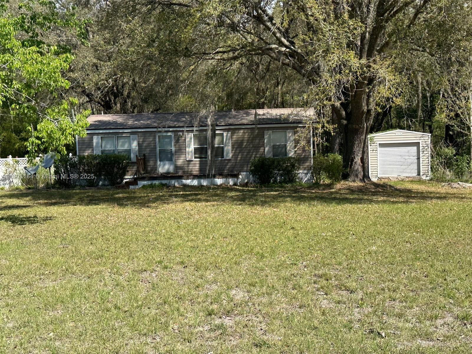 Real estate property located at 345 SE ROLLING HILLS DRIVE, Other, Not In Subdivision, Other City - In The State Of Florida, FL