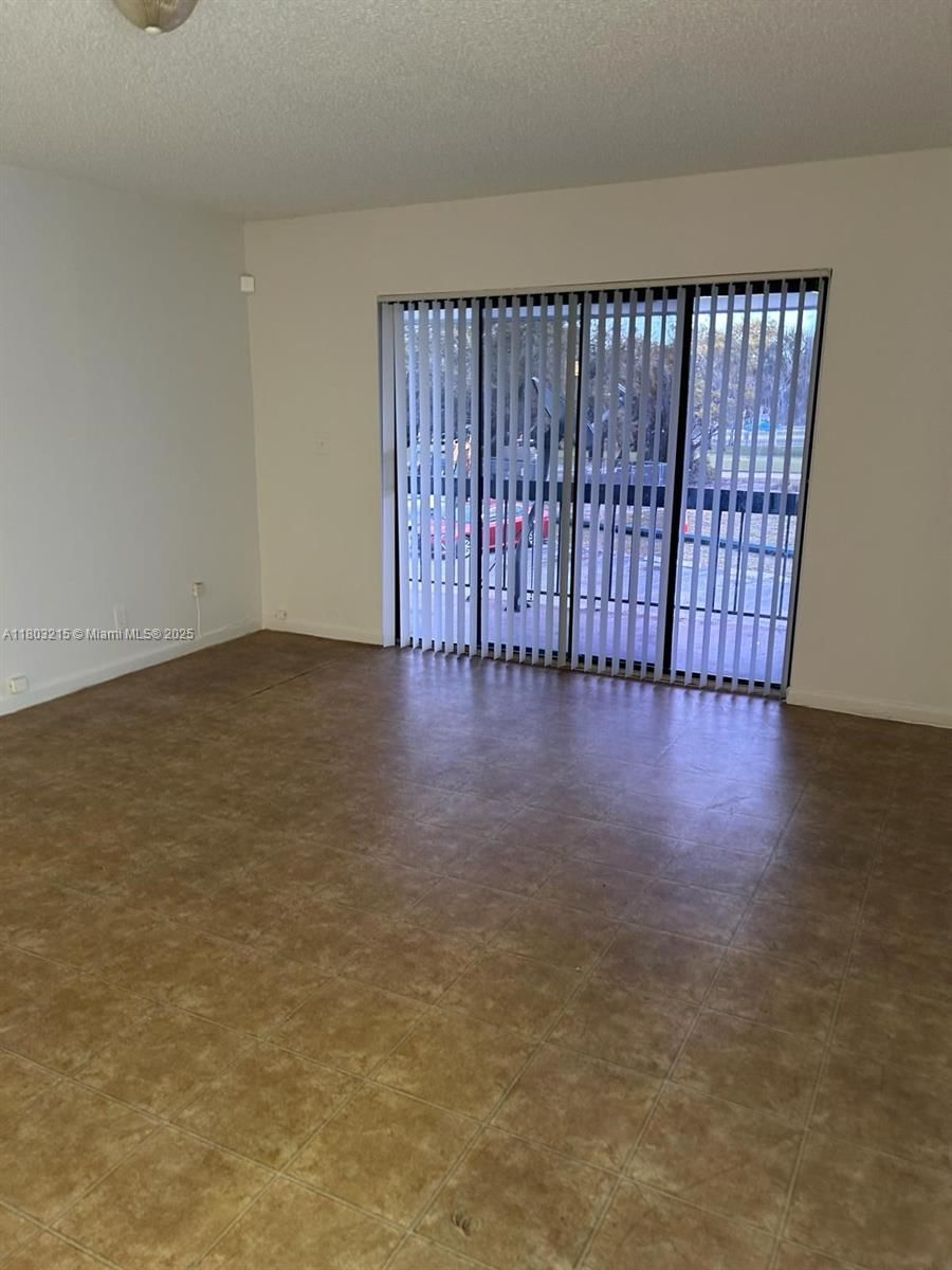 Real estate property located at 4003 University Dr #201, Broward, Sunrise On The Green Cond, Sunrise, FL