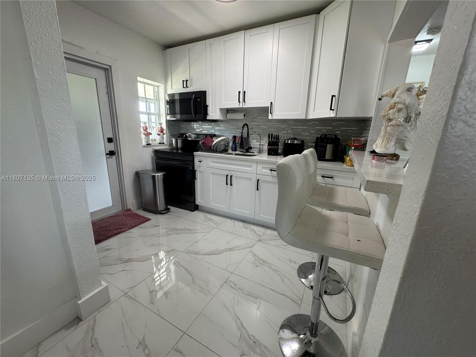 Real estate property located at 14581 Jackson St, Miami-dade, Richmond Heights, Miami, FL