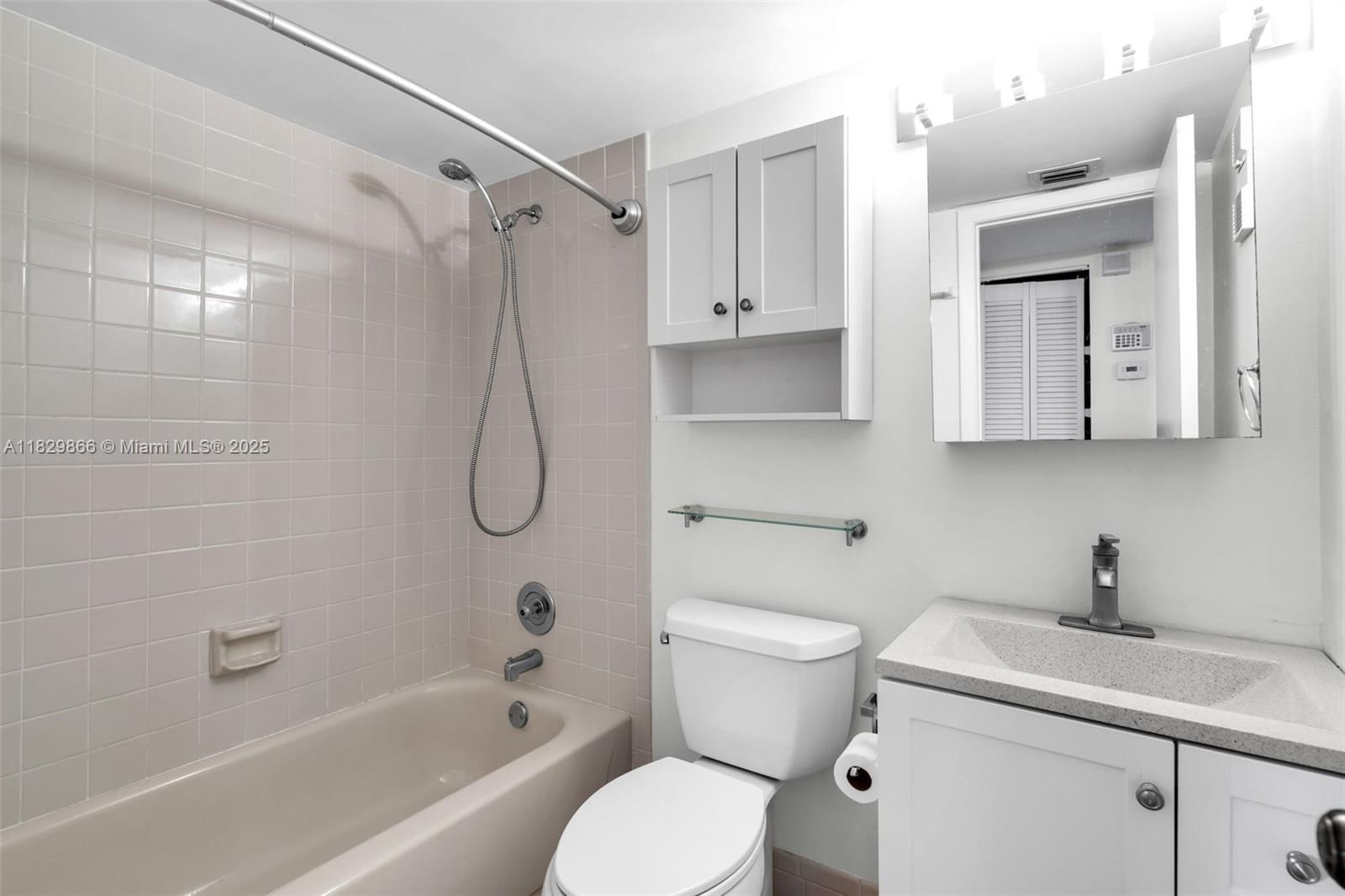 Real estate property located at 2106 Cypress Bend Dr #203, Broward, Cypress Bend Iv-11 Condo, Pompano Beach, FL