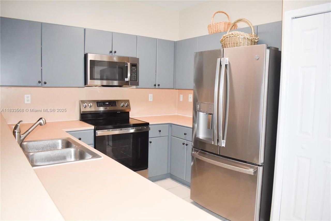 Real estate property located at 9123 152nd Path, Miami-dade, Century Gardens Villas, Miami, FL