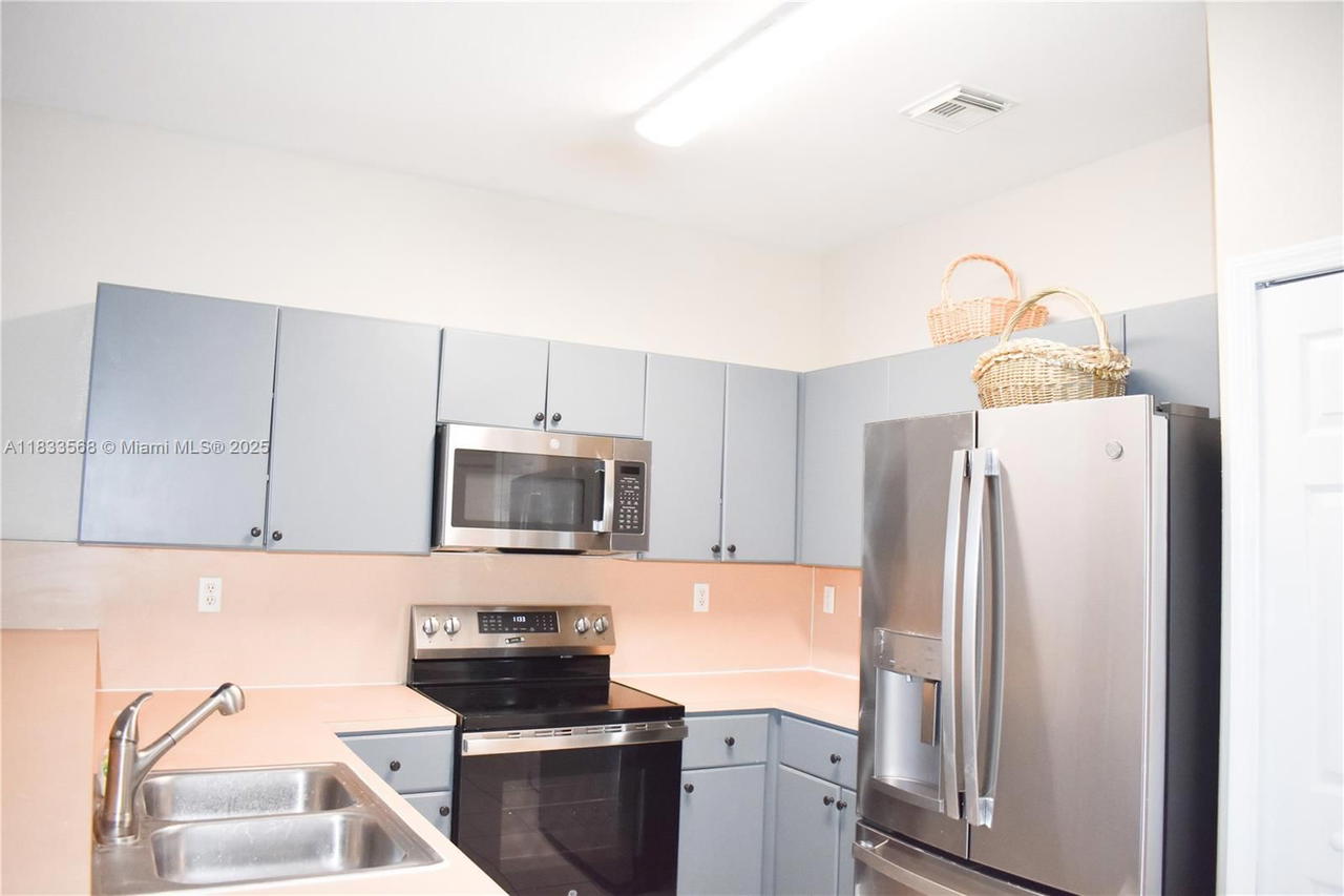 Real estate property located at 9123 152nd Path, Miami-dade, Century Gardens Villas, Miami, FL