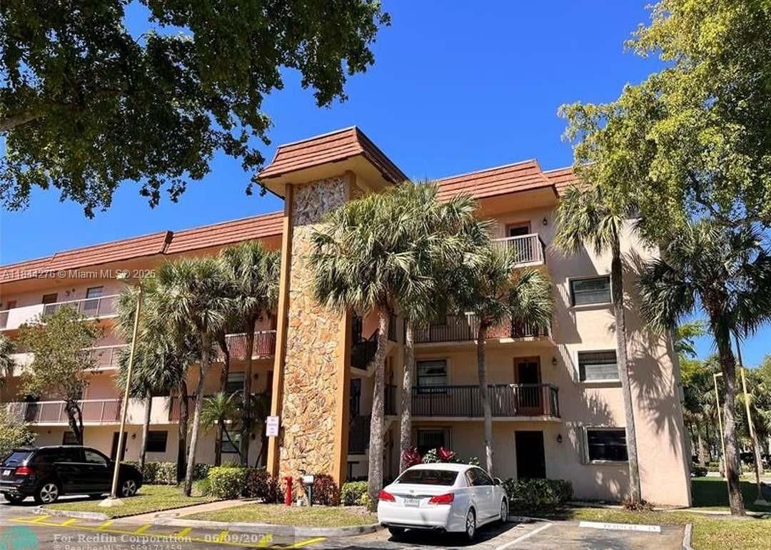 Real estate property located at 4940 Sabal Palm Blvd #205, Broward, Lakes Of Carriage Hills, Tamarac, FL
