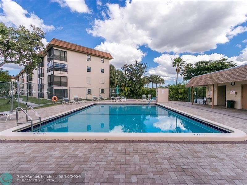 Real estate property located at 4940 Sabal Palm Blvd #205, Broward, Lakes Of Carriage Hills, Tamarac, FL