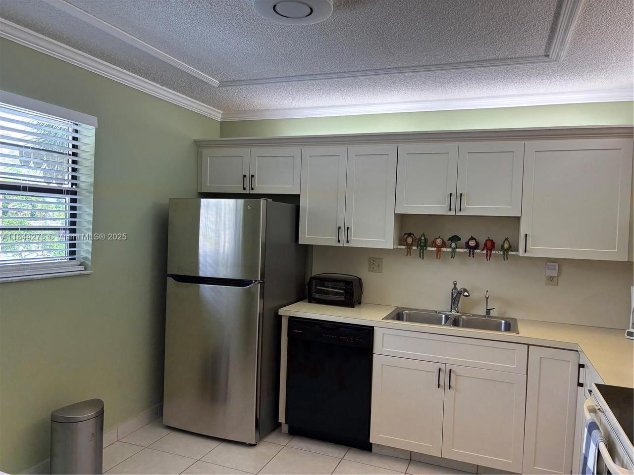 Real estate property located at 4940 Sabal Palm Blvd #205, Broward, Lakes Of Carriage Hills, Tamarac, FL