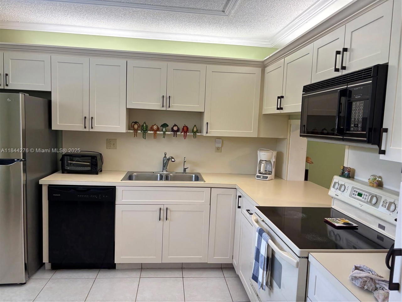 Real estate property located at 4940 Sabal Palm Blvd #205, Broward, Lakes Of Carriage Hills, Tamarac, FL