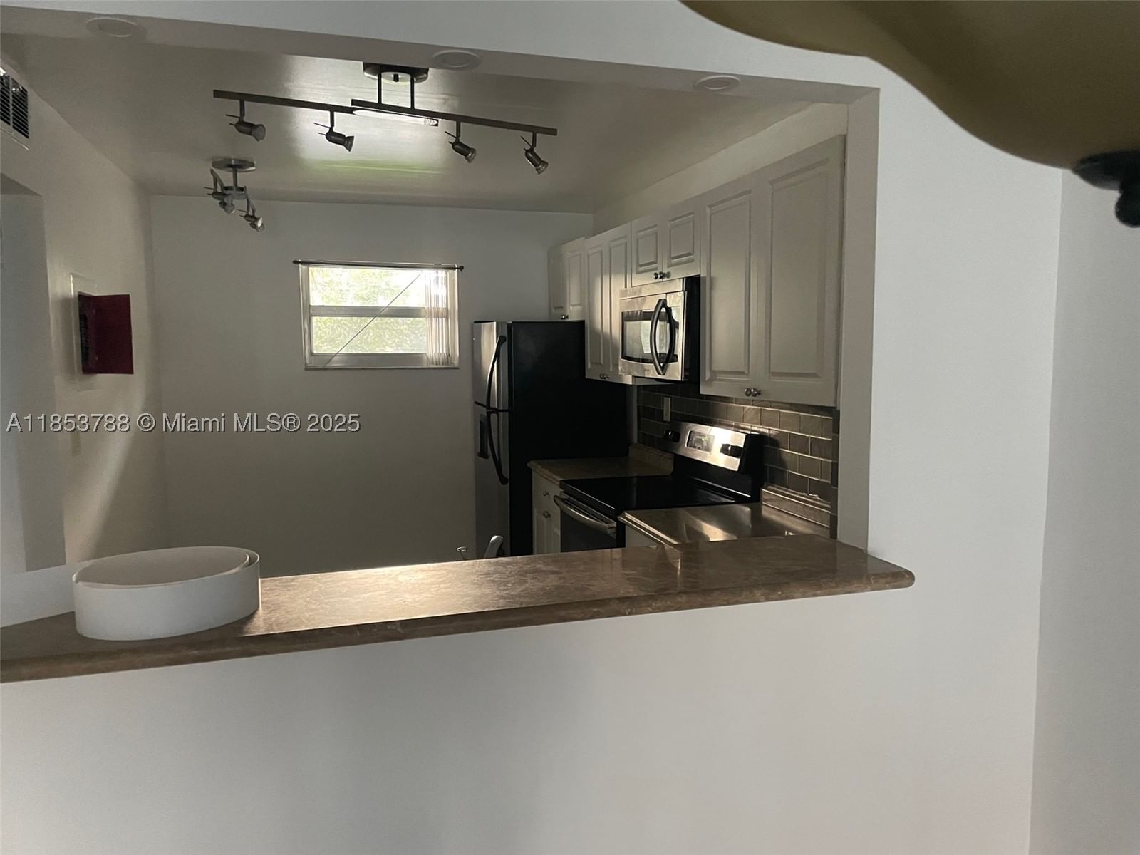 Real estate property located at 1075 Riverside Dr #203, Broward, Sherwood Square Condomini, Coral Springs, FL