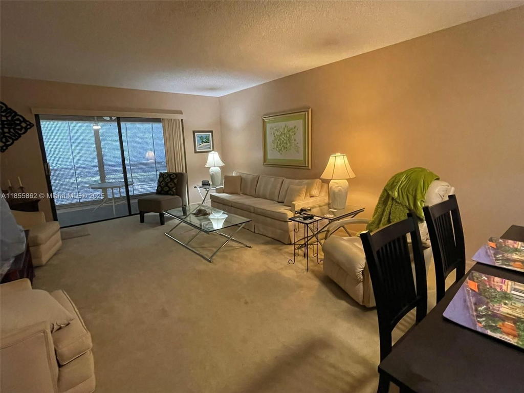 Real estate property located at 4975 Sabal Palm Blvd #208, Broward, Lakes Of Carriage Hills, Tamarac, FL