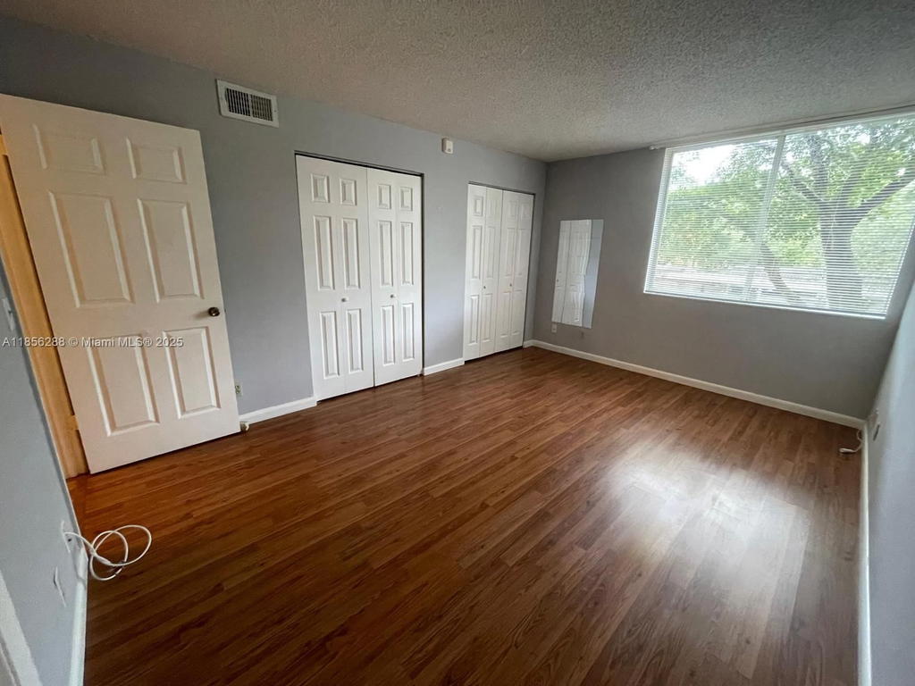 Real estate property located at 10717 Cleary Blvd #207, Broward, Lakes Of Jacaranda Condo, Plantation, FL
