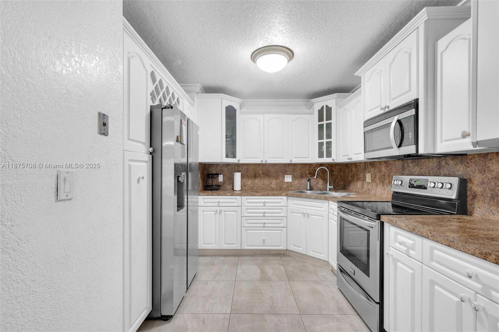 Real estate property located at 1630 46th St #406E, Miami-dade, Silver Spring Tower Condo, Hialeah, FL