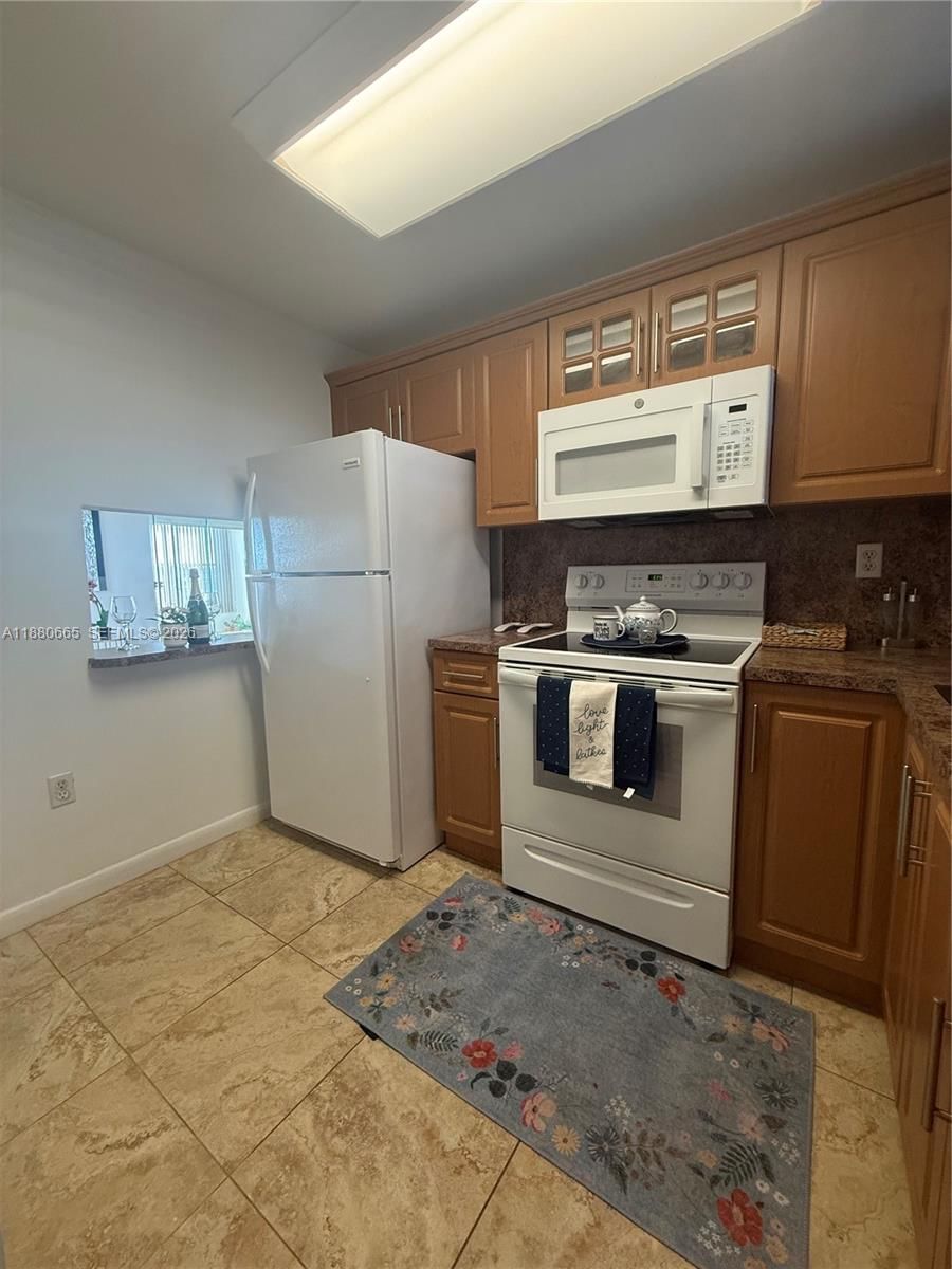 Real estate property located at 8345 Sunrise Lakes Blvd #309, Broward, Sunrise Lakes 42 Condo, Sunrise, FL