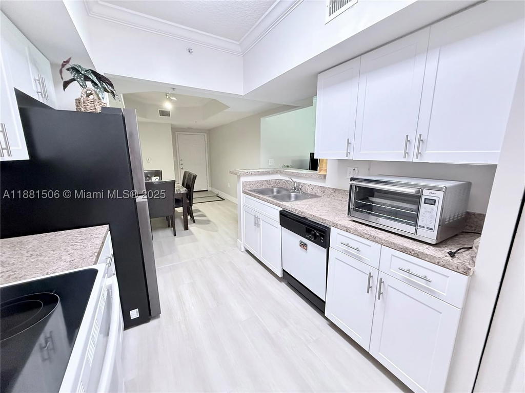 Real estate property located at 11700 1st St #3104, Broward, Marquesa Condo, Pembroke Pines, FL