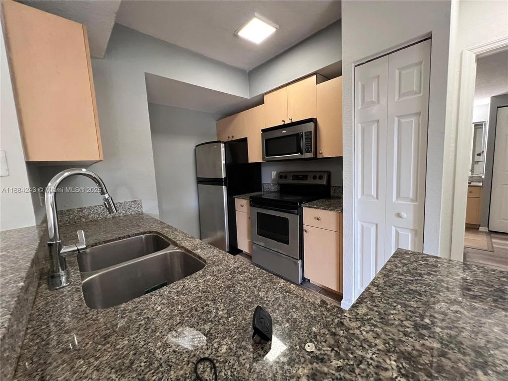 Real estate property located at 2400 Centergate Dr #102, Broward, Aventine At Miramar Condo, Miramar, FL