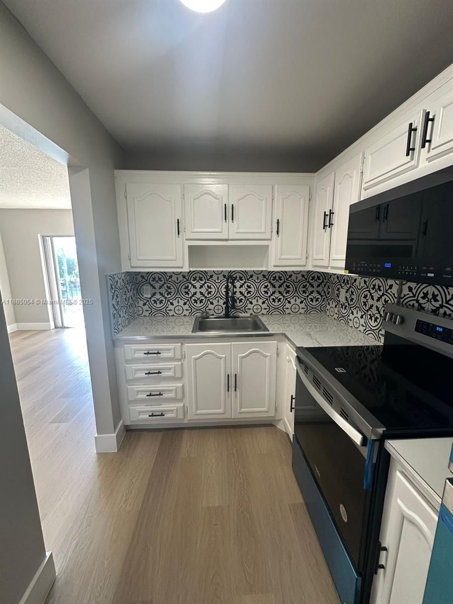 Real estate property located at 1051 1st St #303, Miami-dade, Miramar Terrace Condo, Miami, FL