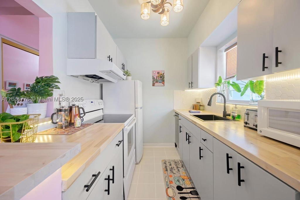 Real estate property located at 315 Van Buren St #104B, Broward, Windwood Seas Condo, Hollywood, FL