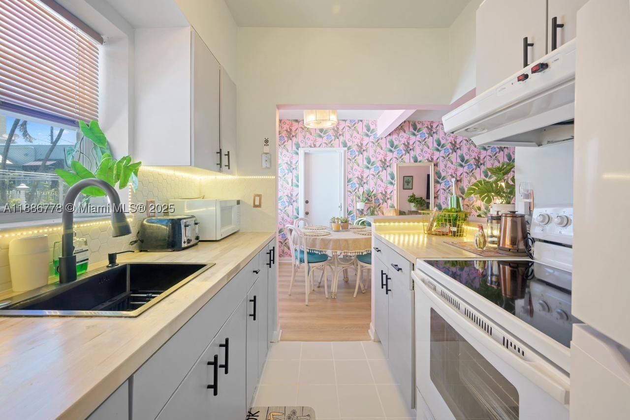 Real estate property located at 315 Van Buren St #104B, Broward, Windwood Seas Condo, Hollywood, FL
