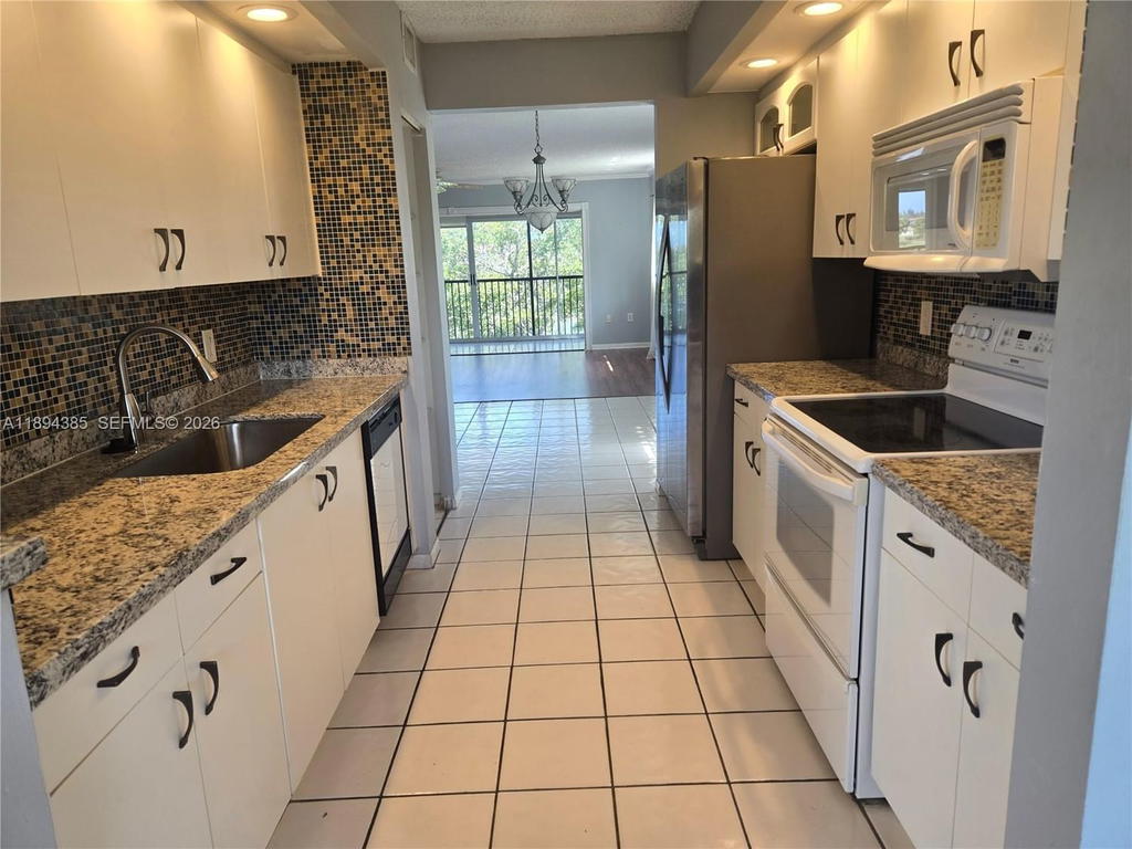 Real estate property located at 1001 141st Ave #412K, Broward, Suffolk At Century Villag, Pembroke Pines, FL