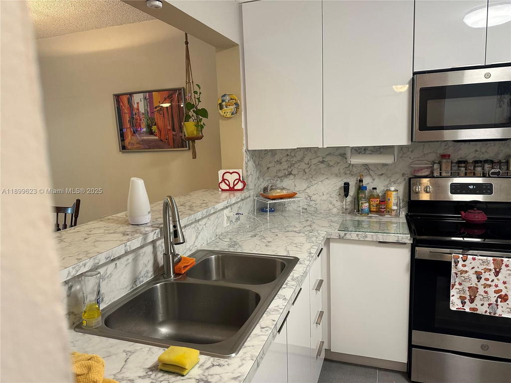 Real estate property located at 1101 58th Ter #108, Broward, Water Bridge 1 Condo, Sunrise, FL