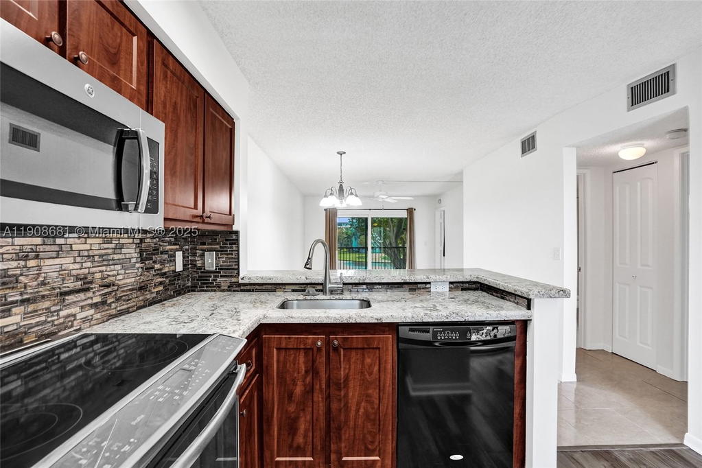 Real estate property located at 2220 Cypress Bend Dr #310, Broward, Cypress Bend Condominium, Pompano Beach, FL