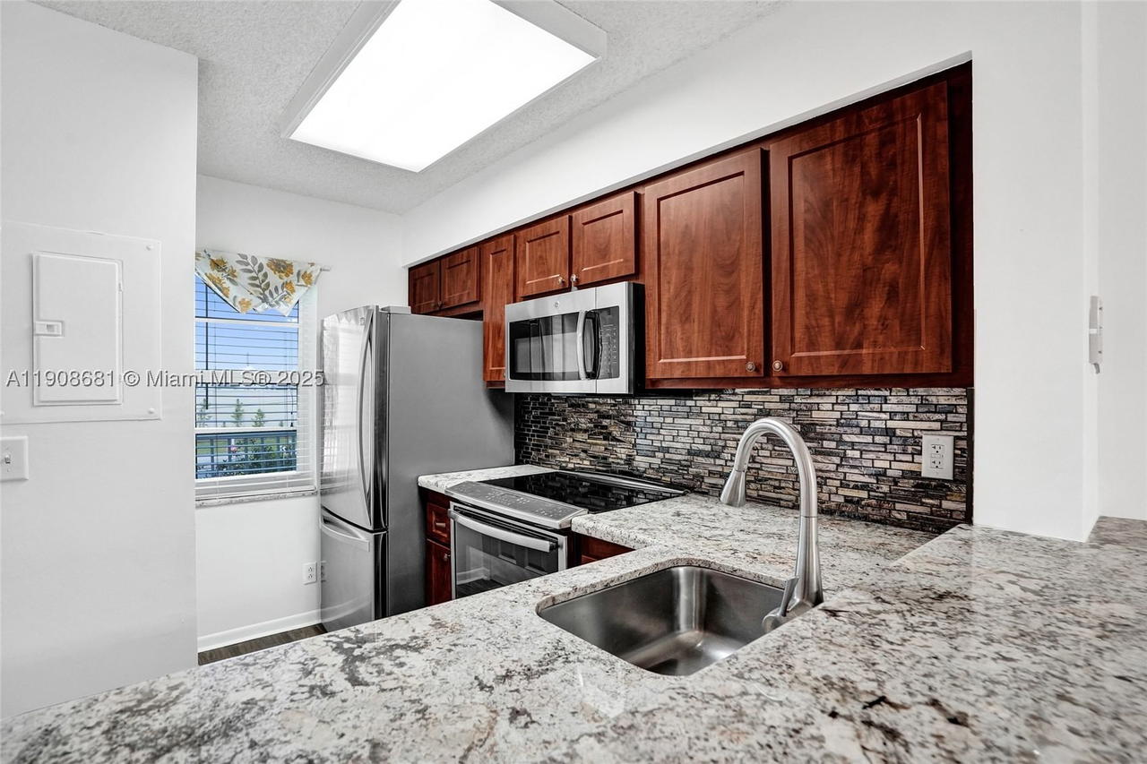 Real estate property located at 2220 Cypress Bend Dr #310, Broward, Cypress Bend Condominium, Pompano Beach, FL