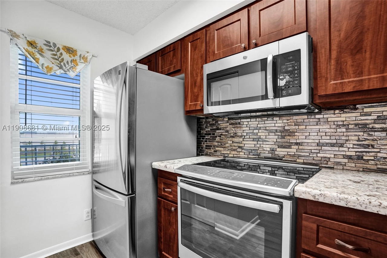 Real estate property located at 2220 Cypress Bend Dr #310, Broward, Cypress Bend Condominium, Pompano Beach, FL