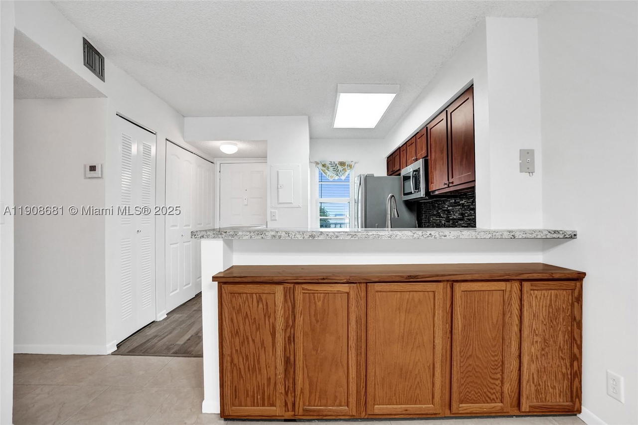 Real estate property located at 2220 Cypress Bend Dr #310, Broward, Cypress Bend Condominium, Pompano Beach, FL