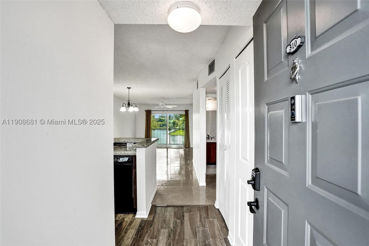 Real estate property located at 2220 Cypress Bend Dr #310, Broward, Cypress Bend Condominium, Pompano Beach, FL