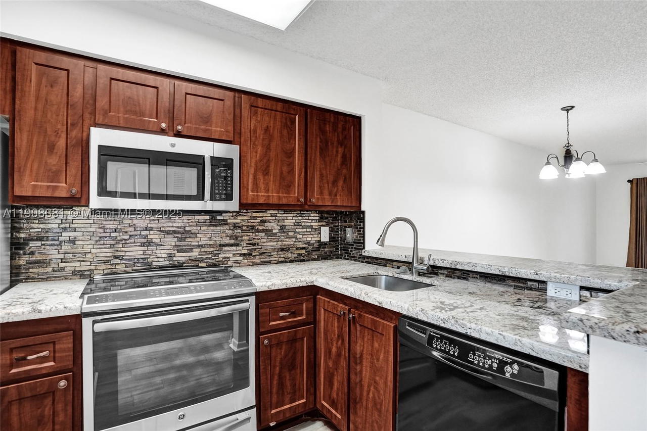 Real estate property located at 2220 Cypress Bend Dr #310, Broward, Cypress Bend Condominium, Pompano Beach, FL