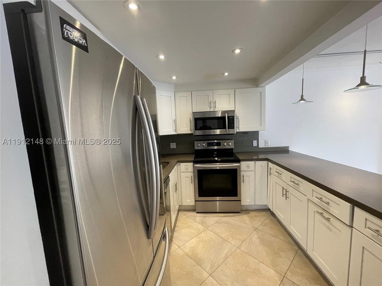 Real estate property located at 1650 115th St #311, Miami-dade, Cricket Clubhouse Condo, Miami, FL