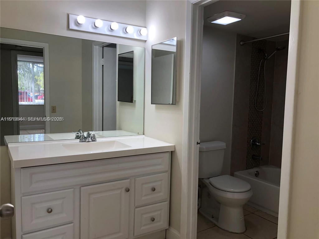 Real estate property located at 10757 Cleary Blvd #104, Broward, Lakes Of Jacaranda Condo, Plantation, FL