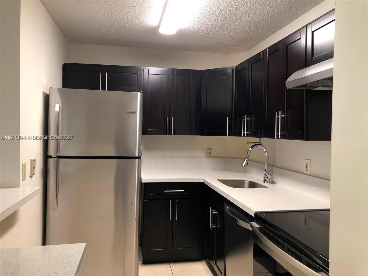 Real estate property located at 10757 Cleary Blvd #104, Broward, Lakes Of Jacaranda Condo, Plantation, FL